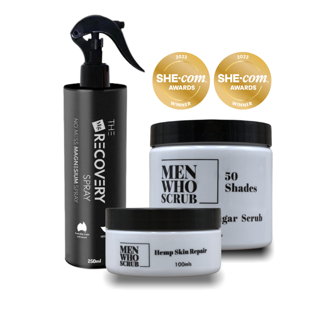 A set of three men's skincare products including a sugar scrub, a magnesium spray, and a hemp skin repair cream, with award badges displayed.